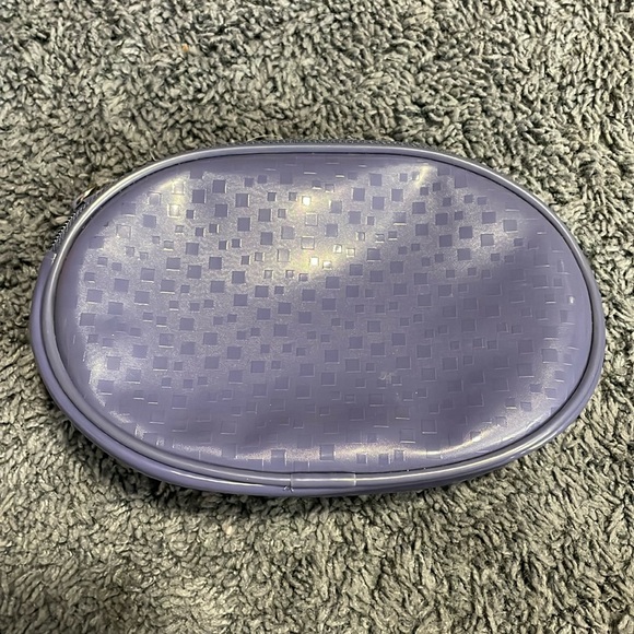 Handbags - NWOT plastic oval pouch with squares design on front